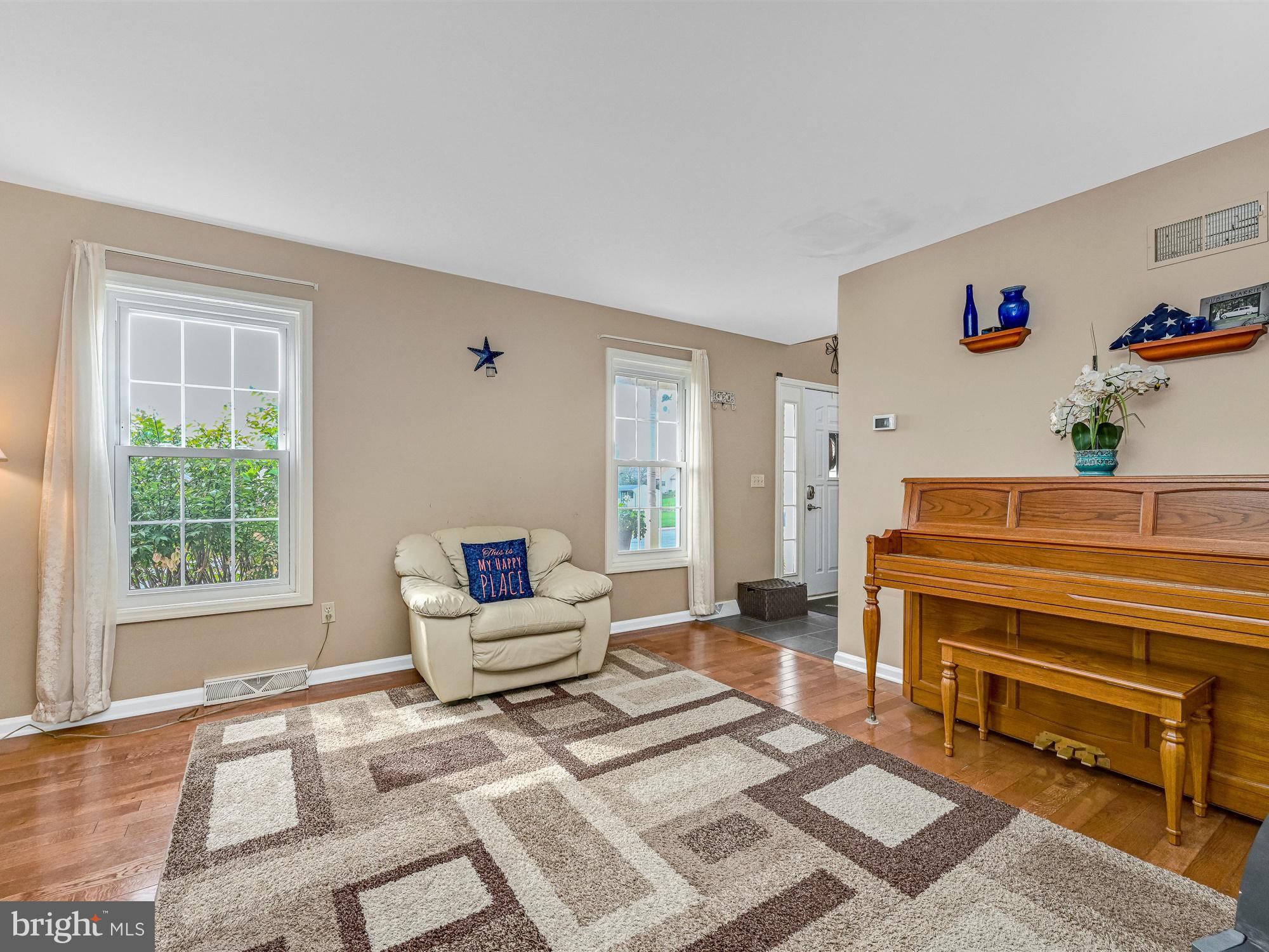 205 Village Spring Lane Reinholds, PA 17569 - Photo 6 of 29 a living room with furniture and a window