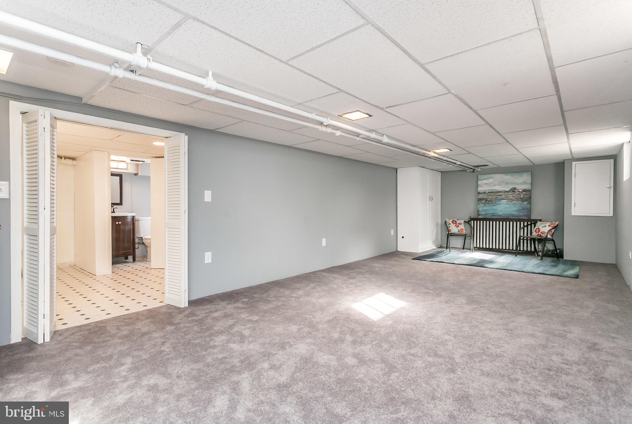 3115 Willoughby Road Baltimore, MD 21234 - Photo 26 of 37 Wall dividing family room space from work area