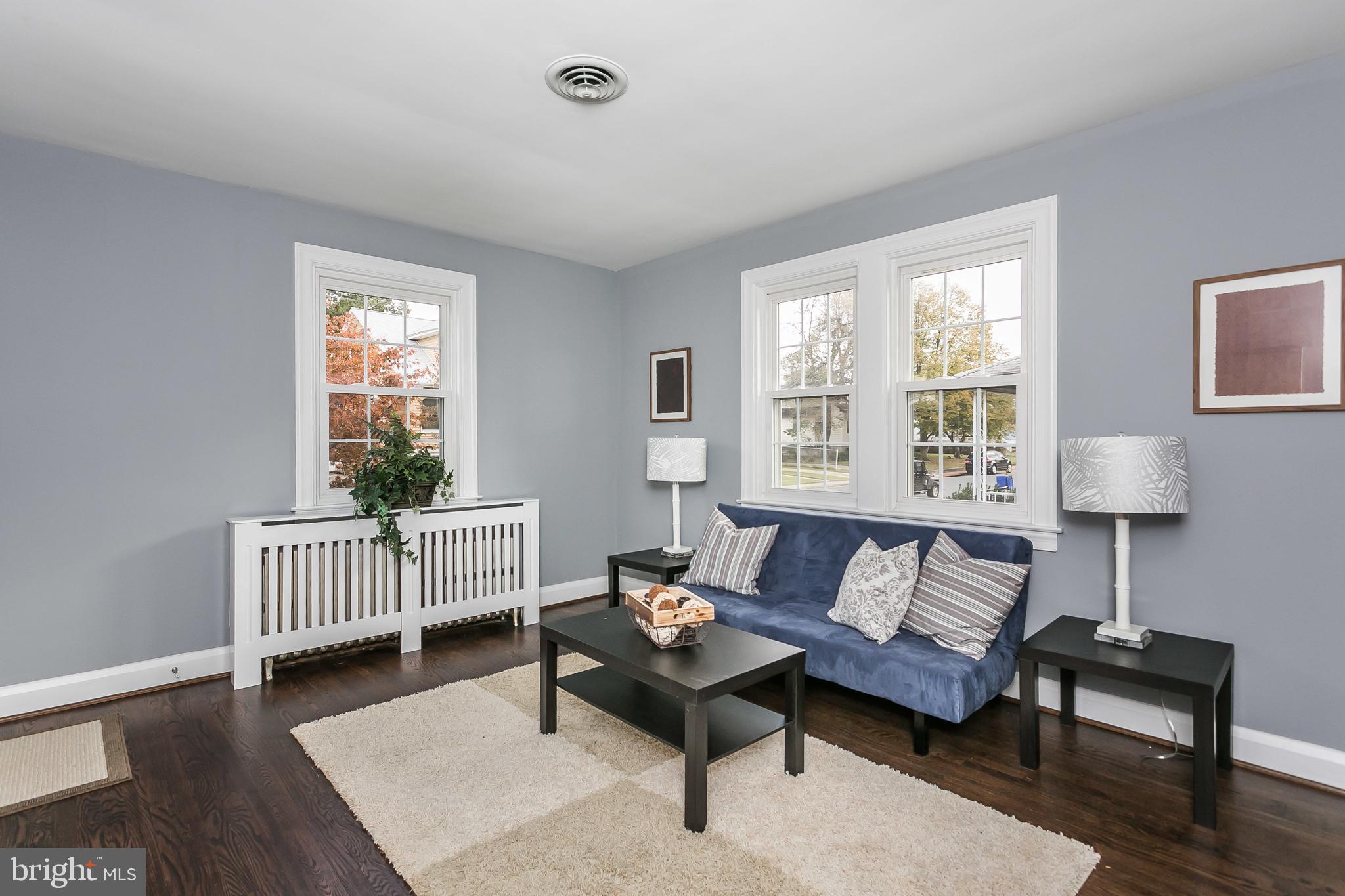 3115 Willoughby Road Baltimore, MD 21234 - Photo 6 of 37 Trimmed out windows and custom radiator cover