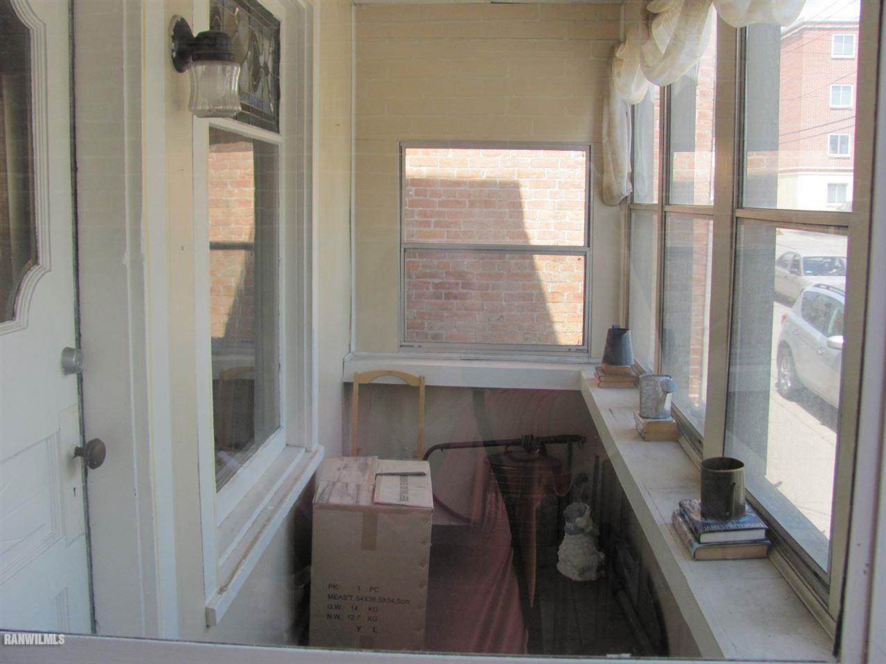 328 Franklin Street Galena, IL 61036 - Photo 11 of 13 a living room with furniture and a large window