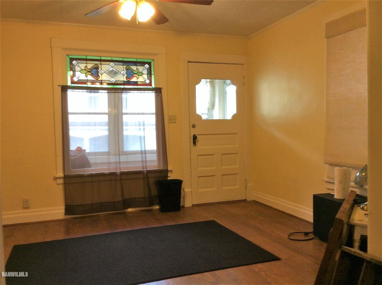 328 Franklin Street Galena, IL 61036 - Photo 4 of 13 a view of an empty room with a window