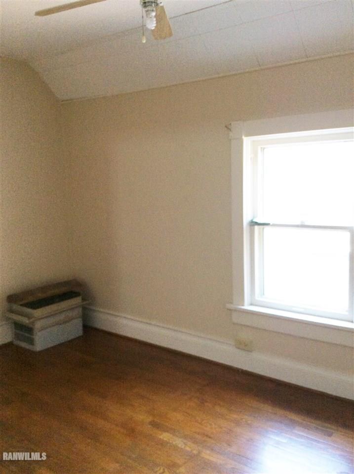 328 Franklin Street Galena, IL 61036 - Photo 6 of 13 a view of an empty room with a window