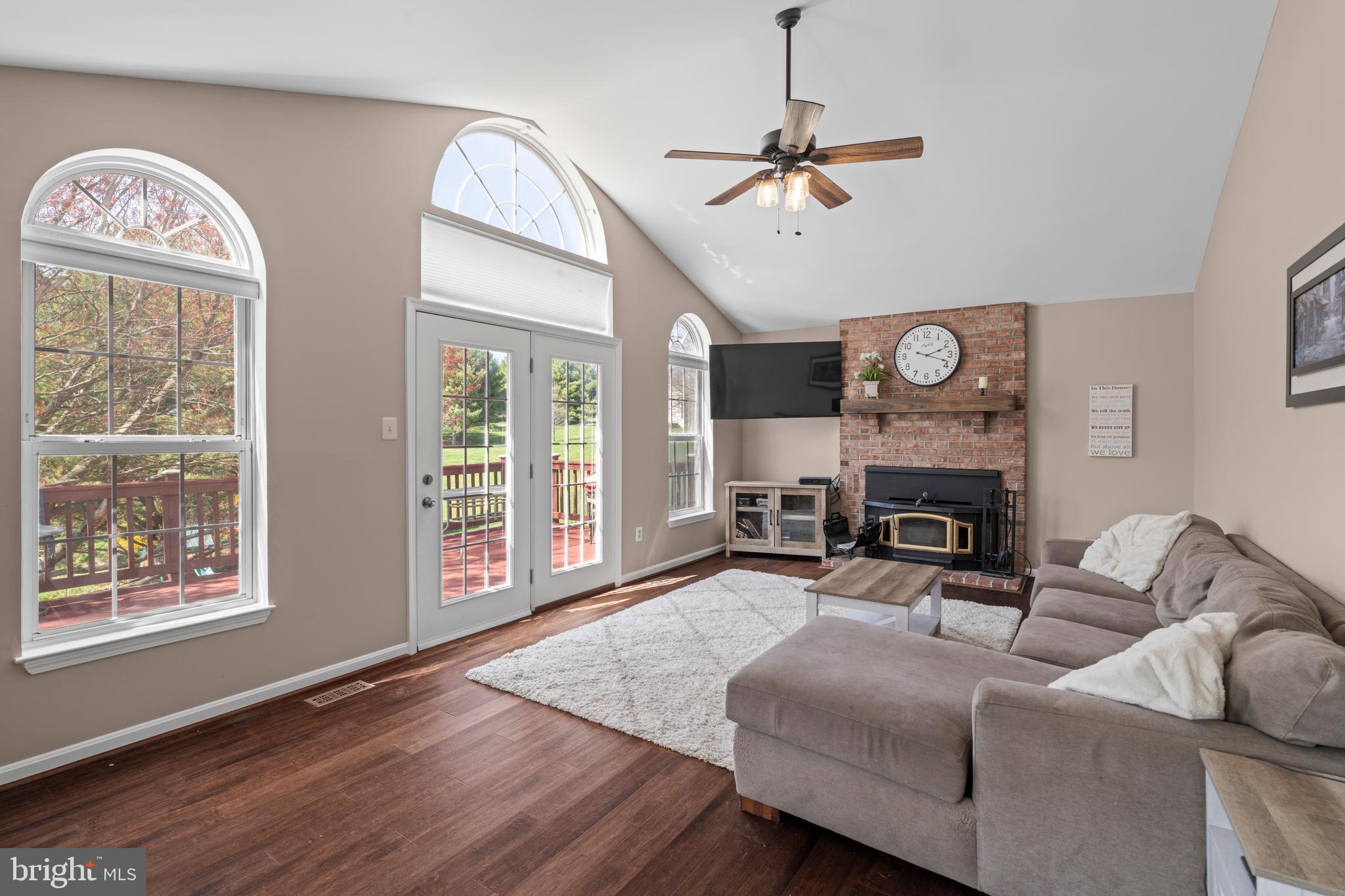 20 Farm Ridge Court Baldwin, MD 21013 - Photo 13 of 47 a living room with furniture a fireplace and a large window