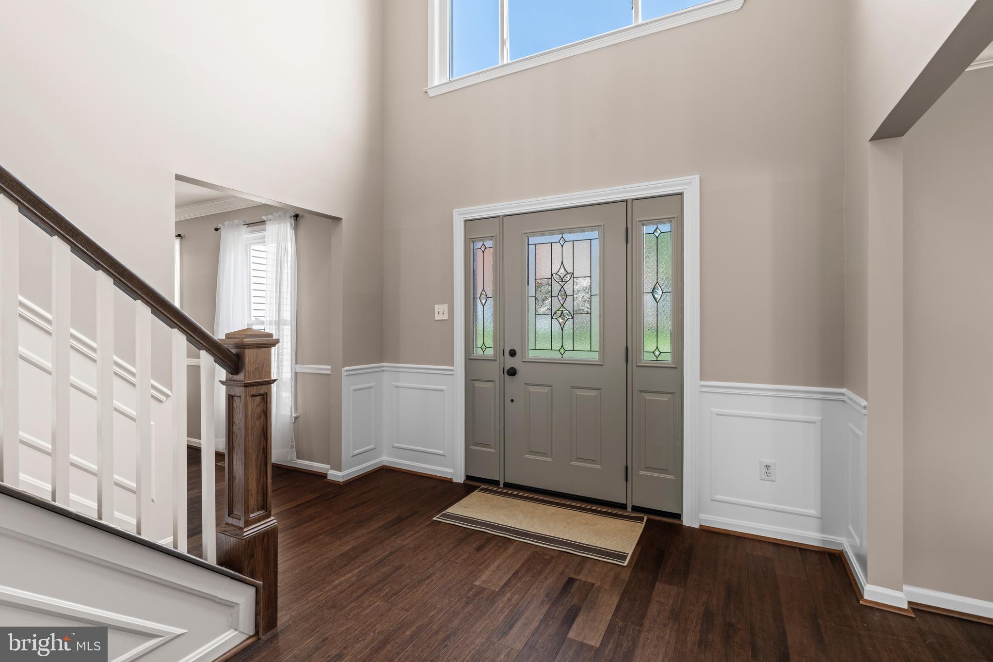 20 Farm Ridge Court Baldwin, MD 21013 - Photo 3 of 47 a view of a hallway with wooden floor and stairs
