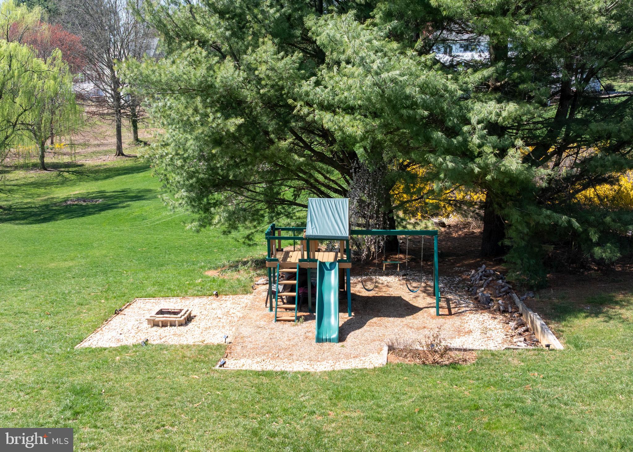 20 Farm Ridge Court Baldwin, MD 21013 - Photo 41 of 47 a view of a backyard with a sitting area