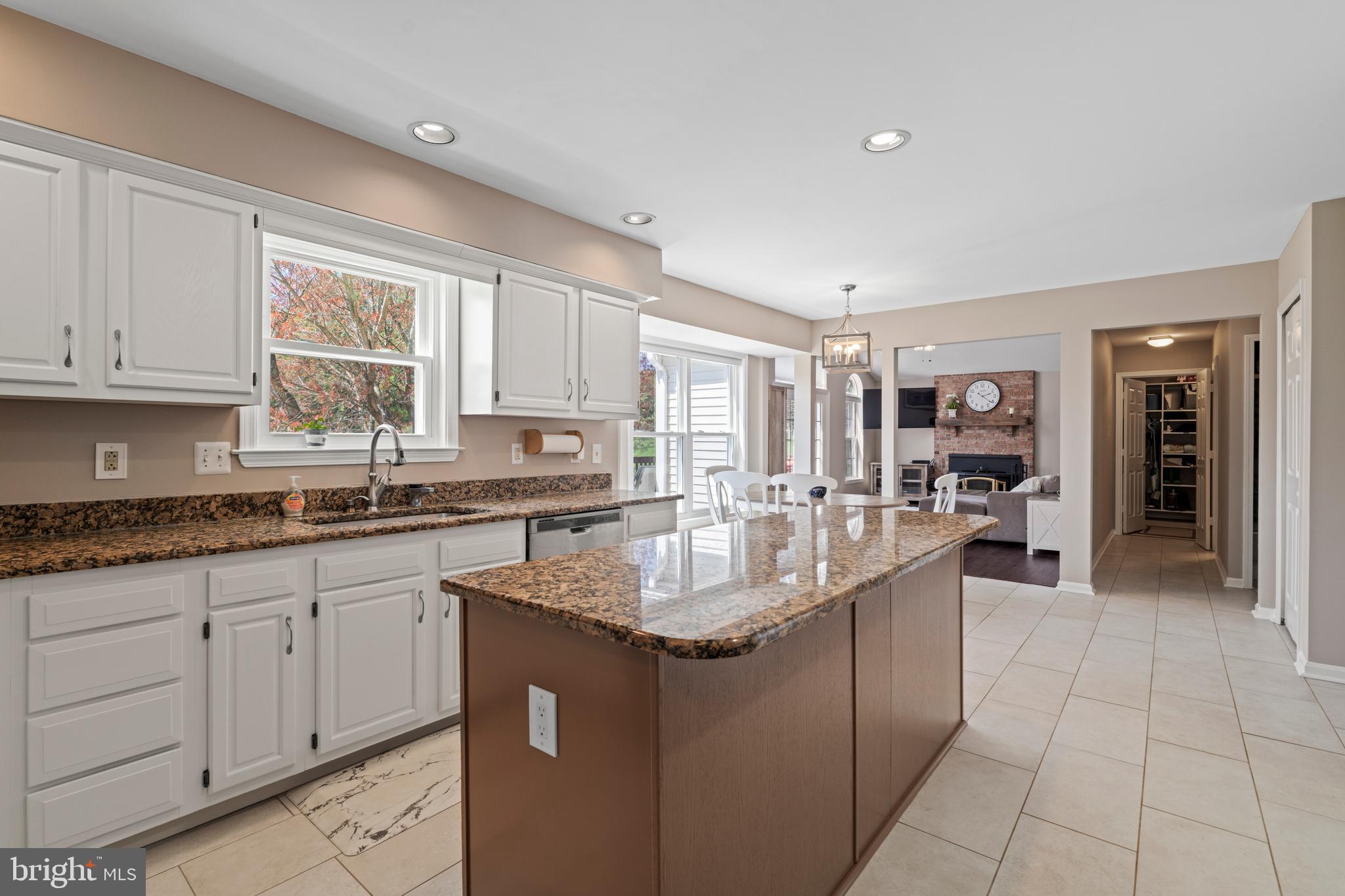 20 Farm Ridge Court Baldwin, MD 21013 - Photo 10 of 47 a kitchen with granite countertop a sink and cabinets