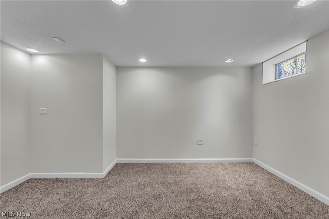 2540 Charney Road University Heights, OH 44118 - Photo 39 of 44 Carpeted room featuring recessed lighting, a neutral wall finish, and a high-set window