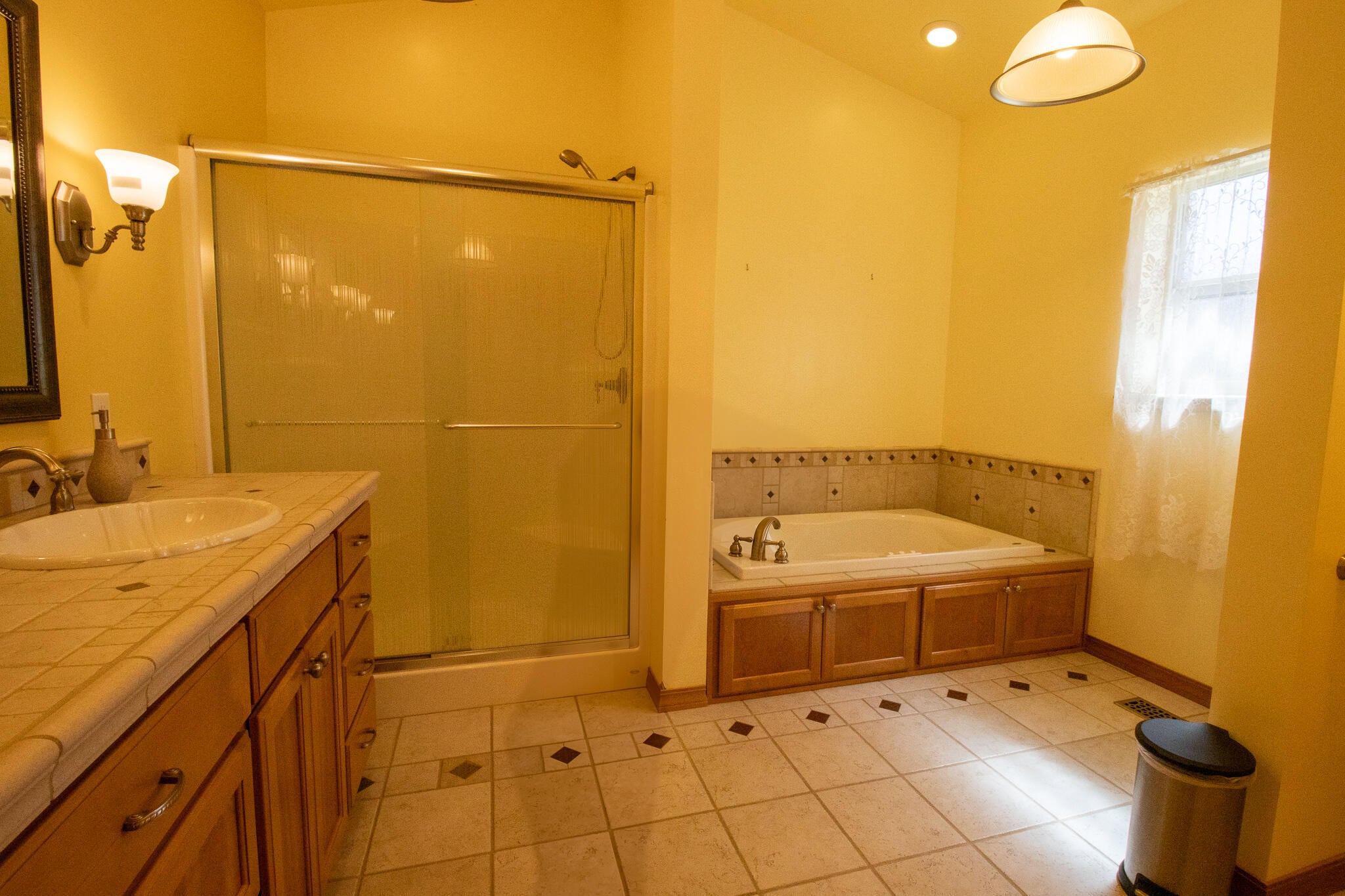 1381 Foss Road Talent, OR 97540 - Photo 17 of 41 Master bath with double vanity and spa tub