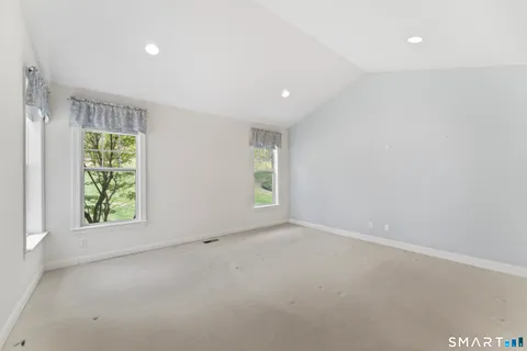 an empty room with windows