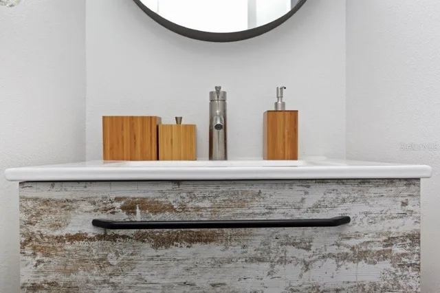 a view of a room with a table and chair