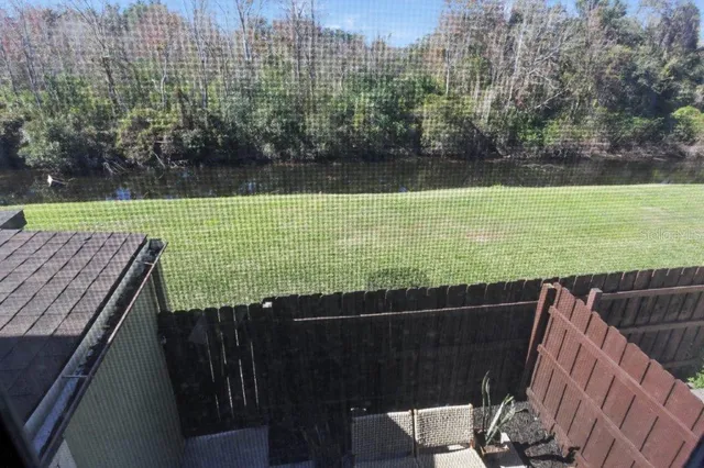 a view of yard with swimming pool