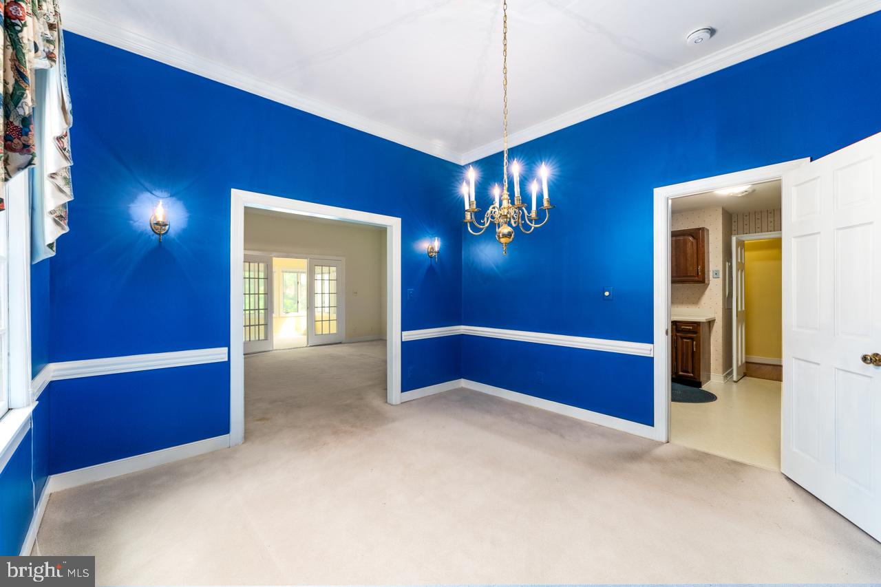 820 Sunken Road, Unit 9 Fredericksburg, VA 22401 - Photo 28 of 41 Dining room to kitchen & living room- old paint