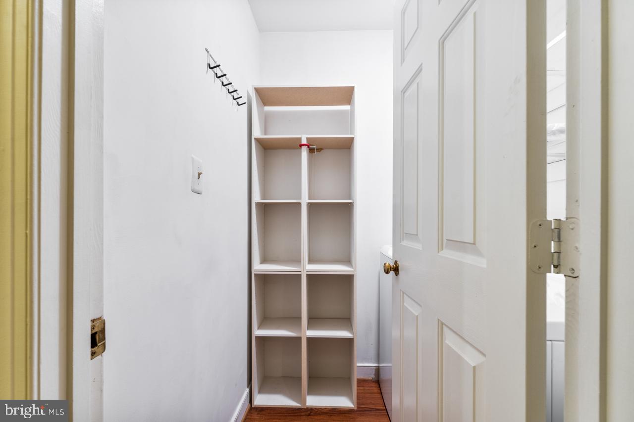 820 Sunken Road, Unit 9 Fredericksburg, VA 22401 - Photo 38 of 41 Laundry room with storage. Washer/dryer convey