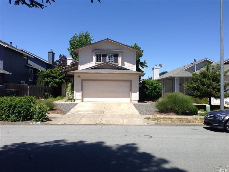 2113 Lapper Avenue Santa Rosa, CA 95403 - Photo 1 of 1 a front view of a house with a yard and garage