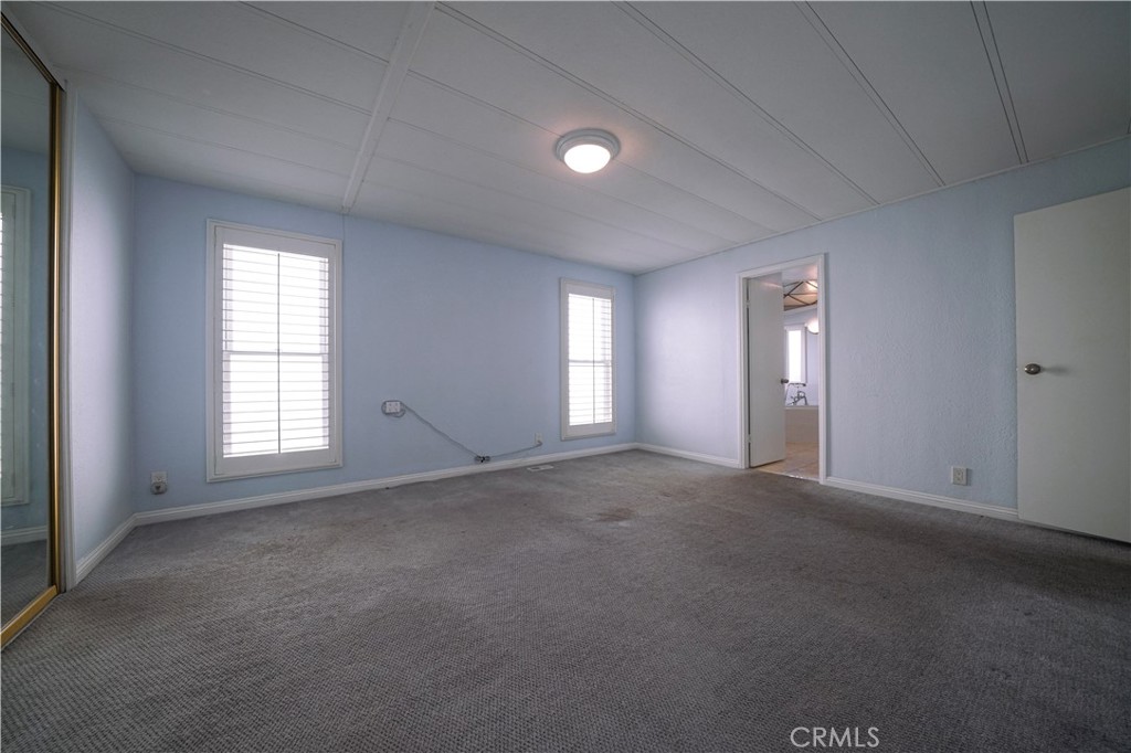 1919 West Coronet Avenue, Unit 190 Anaheim, CA 92801 - Photo 13 of 31 a view of empty room with window