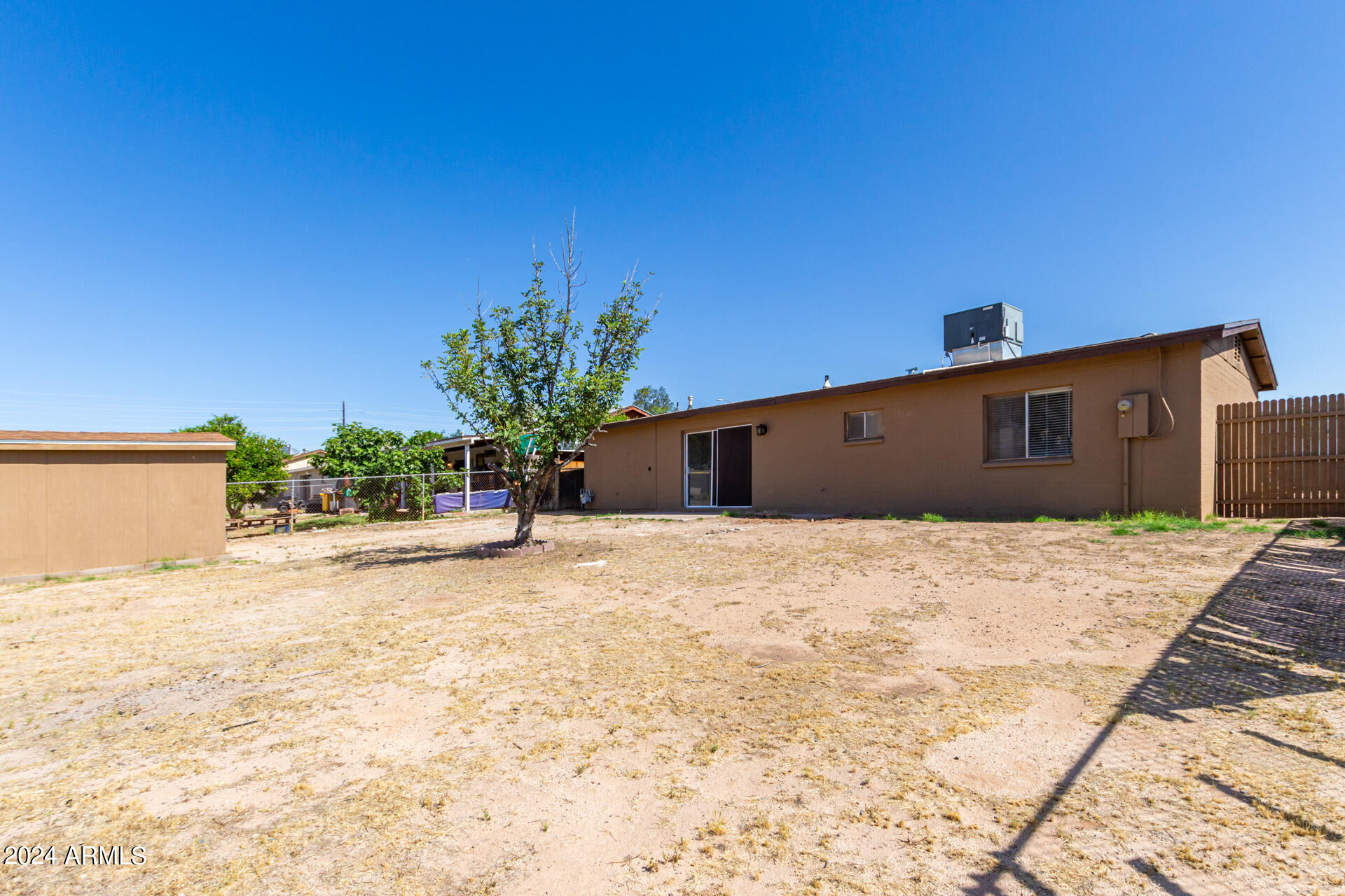 1528 West Maldonado Road Phoenix, AZ 85041 - Photo 19 of 19 a house with a outdoor space