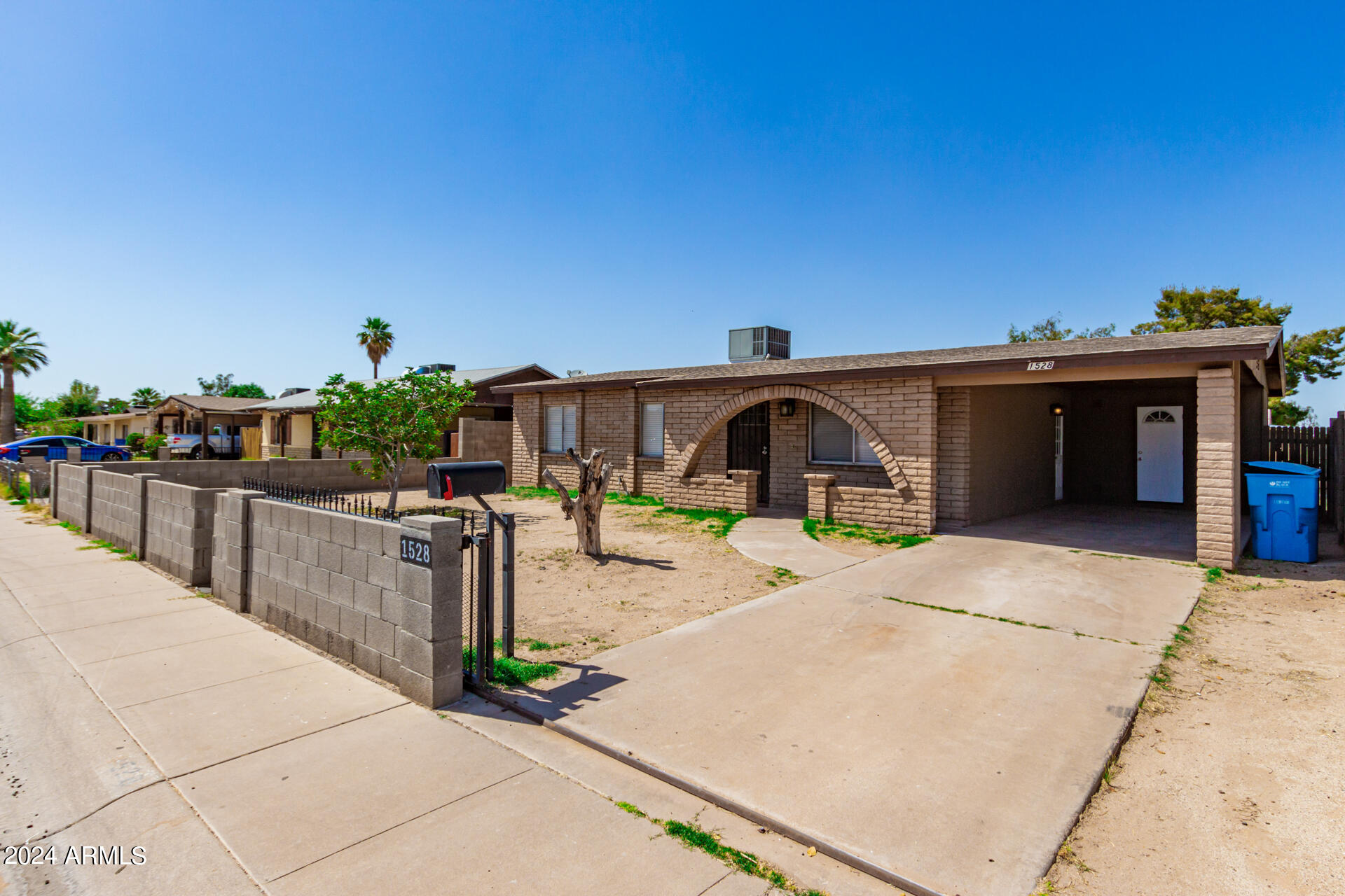 1528 West Maldonado Road Phoenix, AZ 85041 - Photo 2 of 19 a view of a house with sitting area