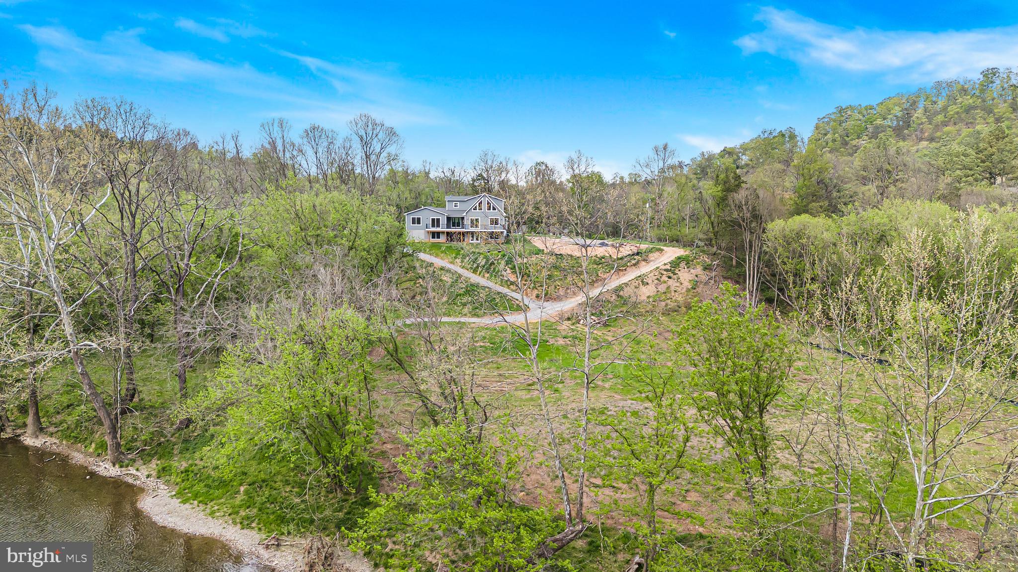 628 Black Bear Road Maurertown, VA 22644 - Photo 12 of 67 a view of a yard with a tree