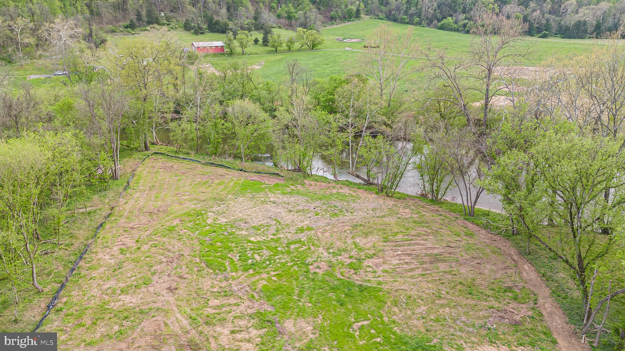 628 Black Bear Road Maurertown, VA 22644 - Photo 23 of 67 a view of a yard with an outdoor space