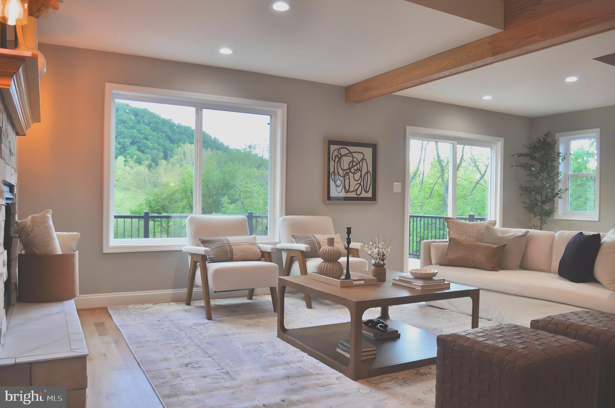 628 Black Bear Road Maurertown, VA 22644 - Photo 26 of 67 a living room with furniture and a large window