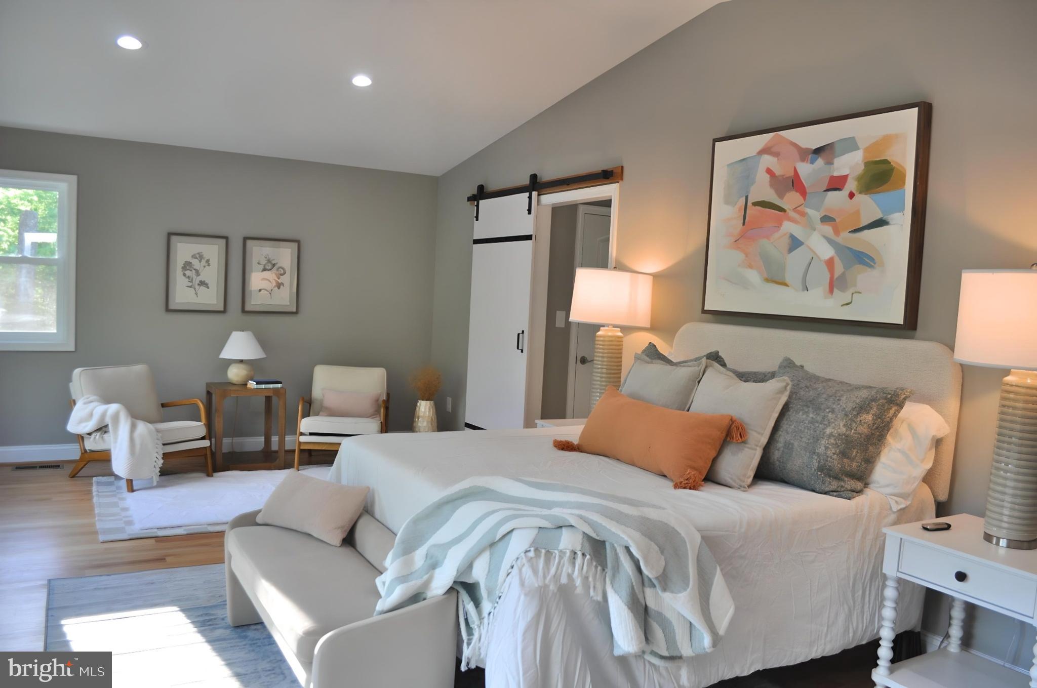 628 Black Bear Road Maurertown, VA 22644 - Photo 6 of 67 a bedroom with a bed and a couch