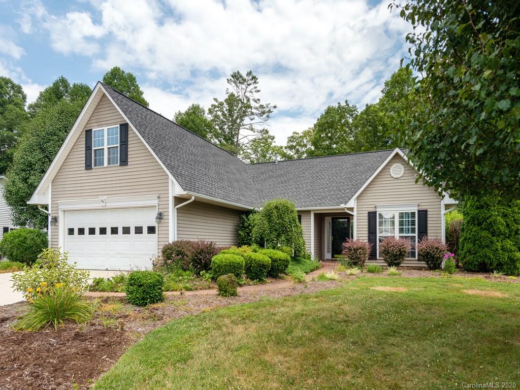 86 Stonehollow Road Fletcher, NC 28732 - Photo 1 of 23 a front view of a house with garden