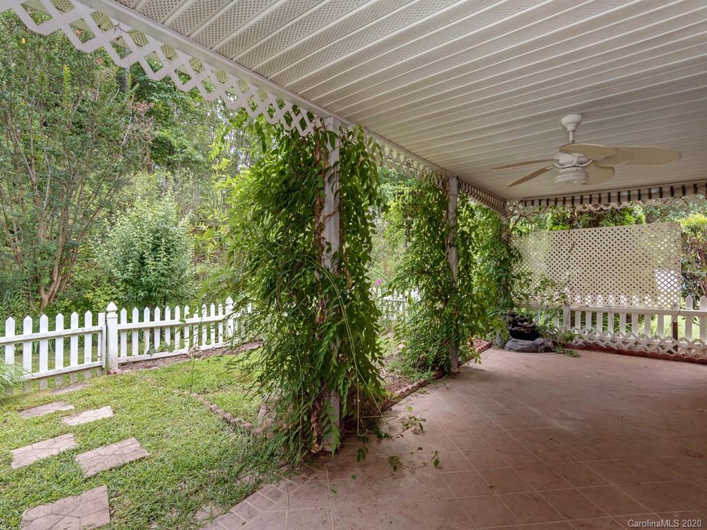 86 Stonehollow Road Fletcher, NC 28732 - Photo 13 of 23 a view of a garden with an outdoor space