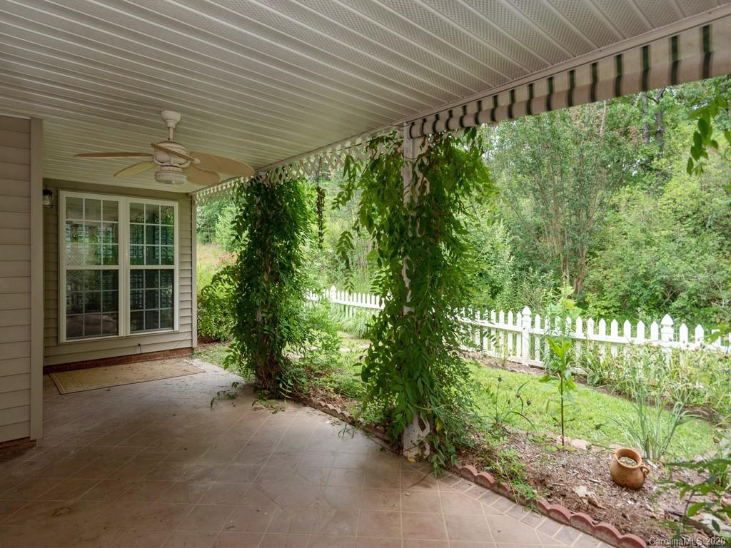 86 Stonehollow Road Fletcher, NC 28732 - Photo 14 of 23 a porch with a trees in front of it