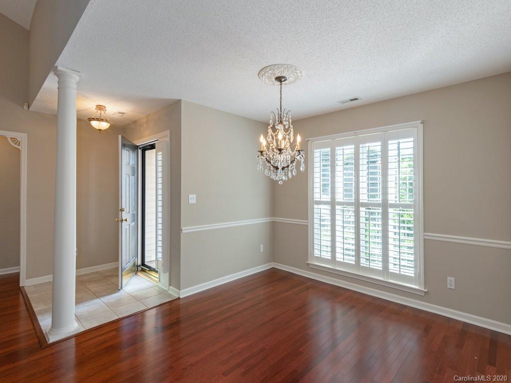 86 Stonehollow Road Fletcher, NC 28732 - Photo 3 of 23 a view of empty room with wooden floor and fan