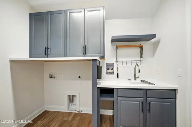 a bathroom with a sink vanity and mirror