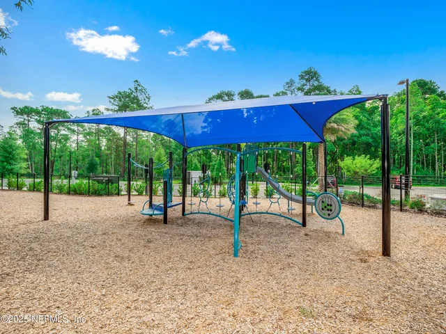 a view of outdoor space with garden and deck