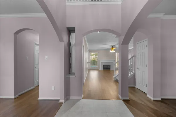 wooden floor with a bathroom