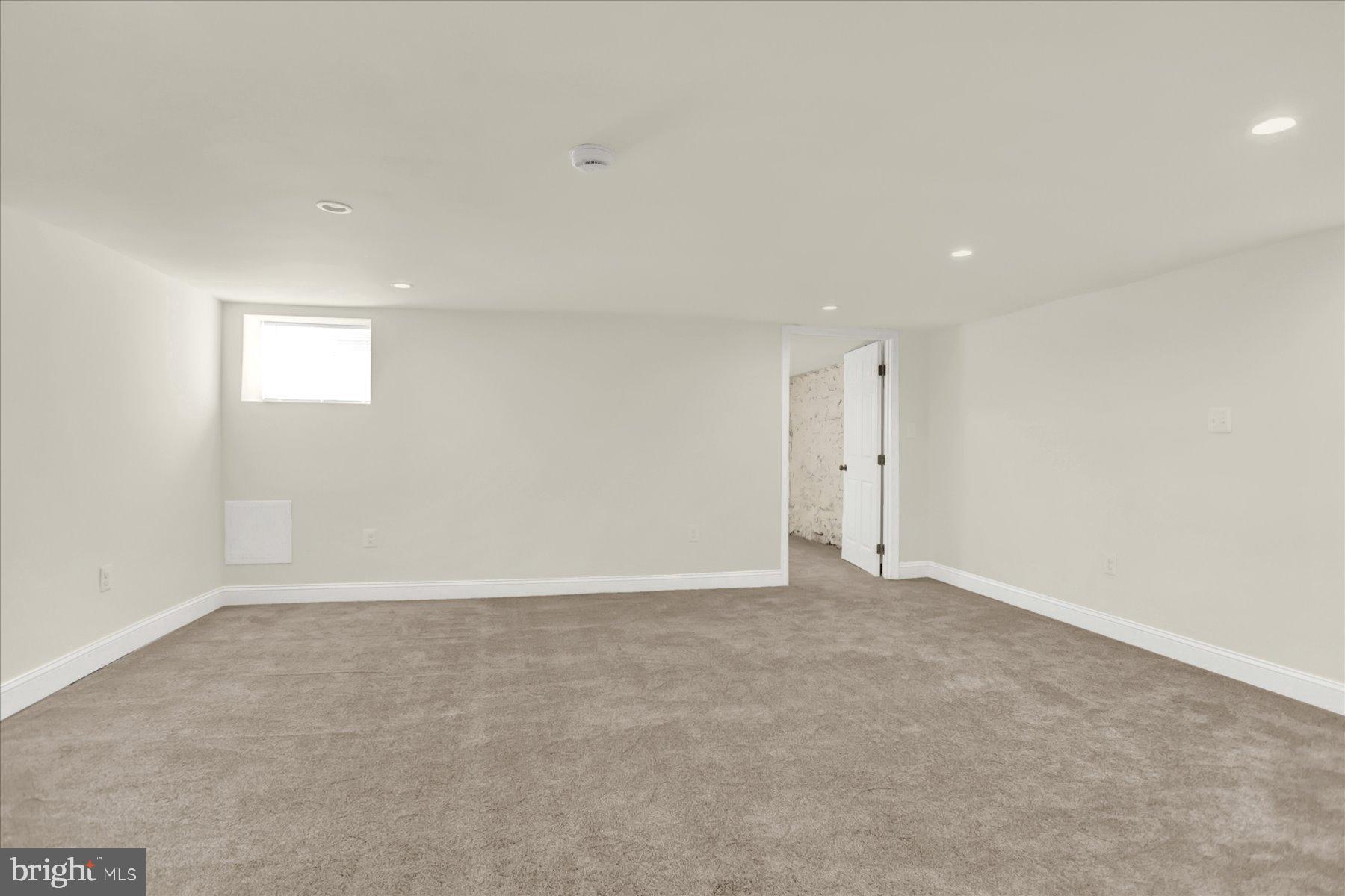 2920 Brighton Street Baltimore, MD 21216 - Photo 26 of 32 an empty room with an entryway