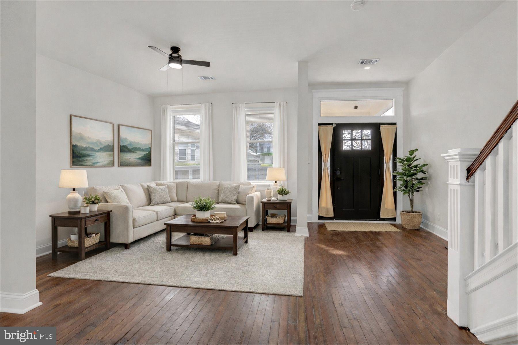 2920 Brighton Street Baltimore, MD 21216 - Photo 5 of 32 a living room with furniture and wooden floor