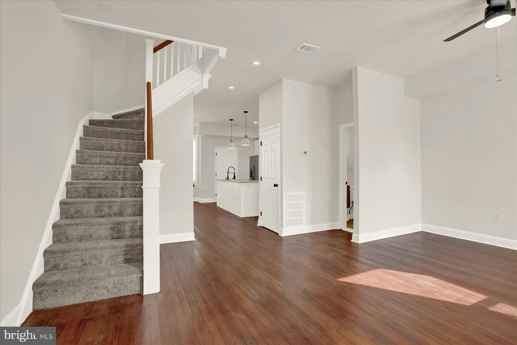 2920 Brighton Street Baltimore, MD 21216 - Photo 6 of 32 a view of entryway with wooden floor