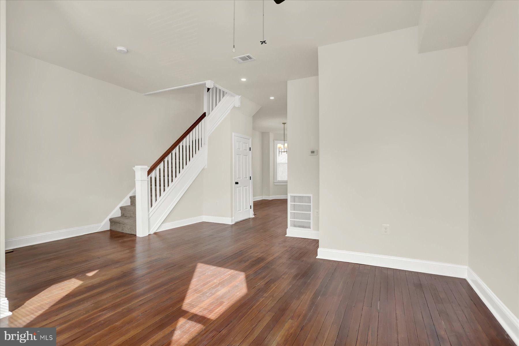 2920 Brighton Street Baltimore, MD 21216 - Photo 7 of 32 a view of entryway with wooden floor