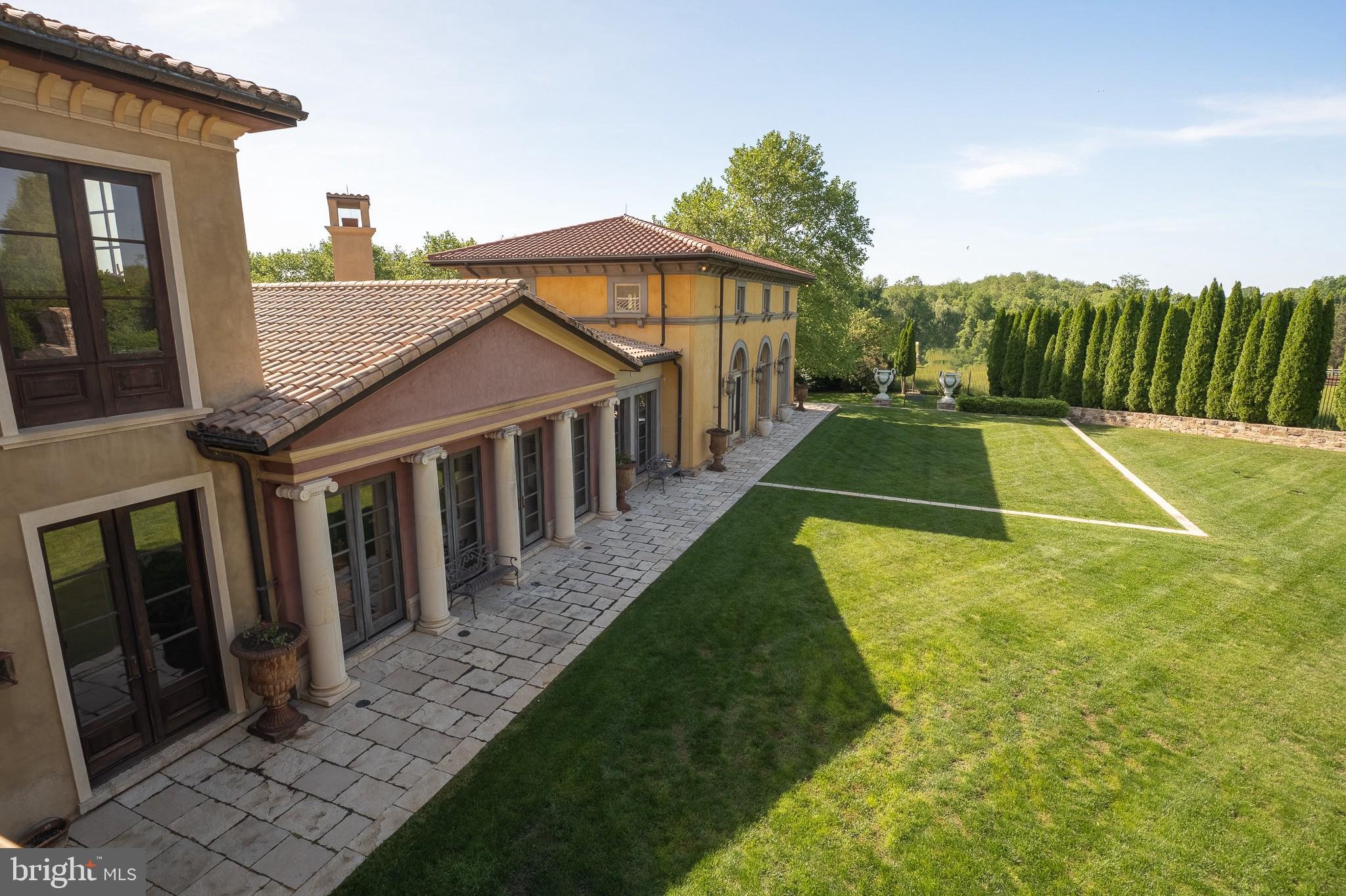 13320 Signal Tree Lane Potomac, MD 20854 - Photo 25 of 143 Rear courtyard through huge glass doors
