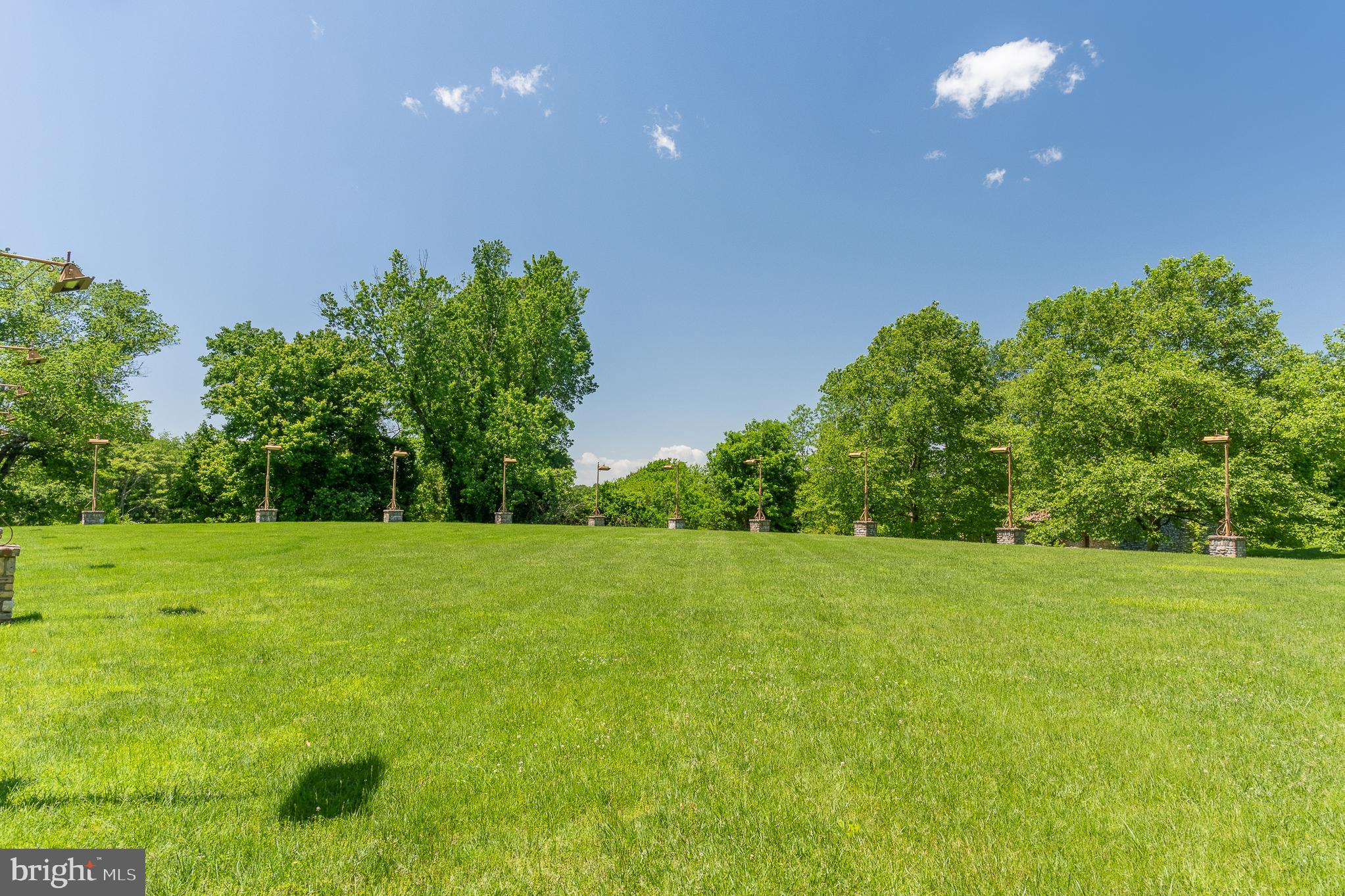 13320 Signal Tree Lane Potomac, MD 20854 - Photo 41 of 143 Custom designed lampposts set in stone pillars