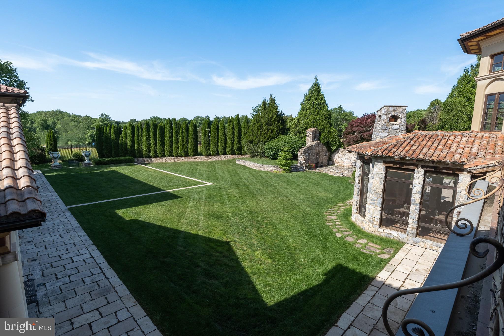 13320 Signal Tree Lane Potomac, MD 20854 - Photo 44 of 143 back yard reflects traditional Tuscan landscaping
