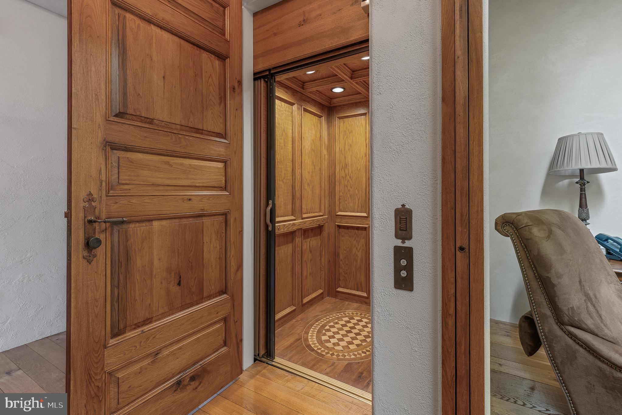 13320 Signal Tree Lane Potomac, MD 20854 - Photo 61 of 143 Elevator boasts solid wood floor medallion pattern