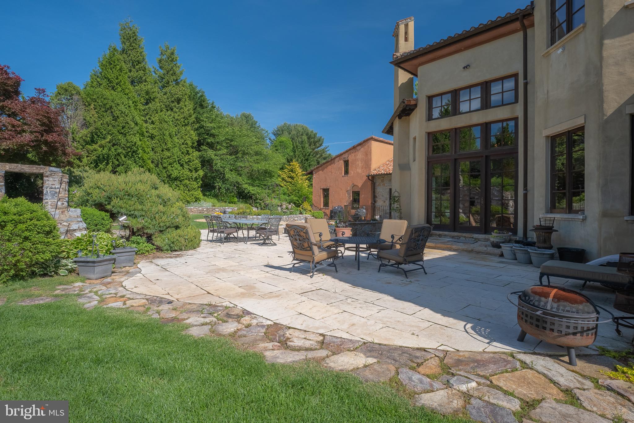 13320 Signal Tree Lane Potomac, MD 20854 - Photo 72 of 143 Hand-hewn gold limestone patio uniquely quarried