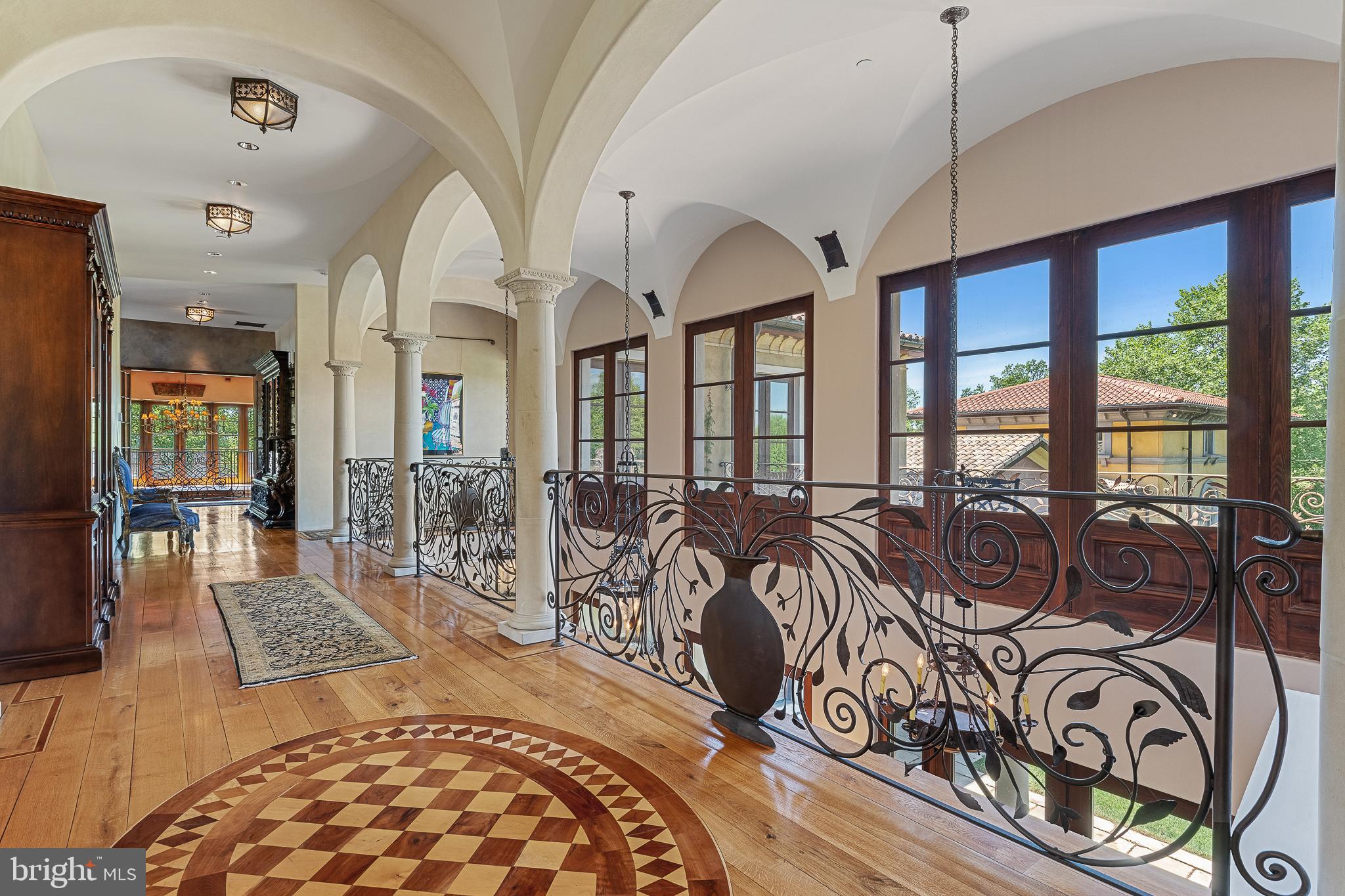 13320 Signal Tree Lane Potomac, MD 20854 - Photo 92 of 143 Solid wood medallions duplicate pattern in foyer