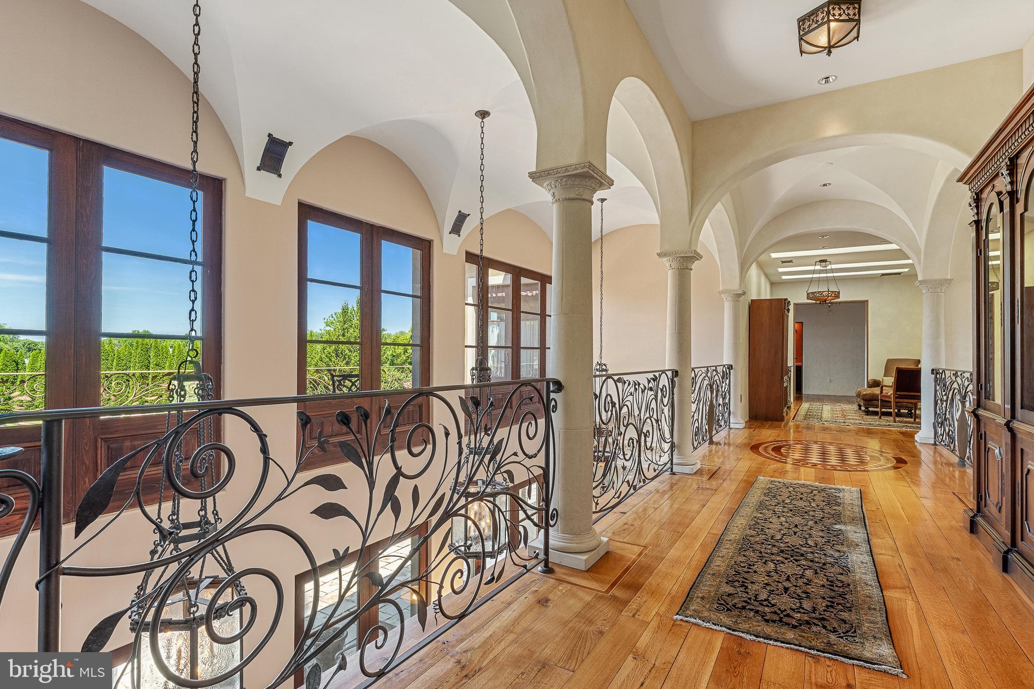 13320 Signal Tree Lane Potomac, MD 20854 - Photo 93 of 143 Grand Upper Level Hallway,hand forged iron railing