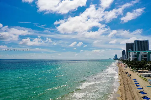 a view of a city with tall buildings