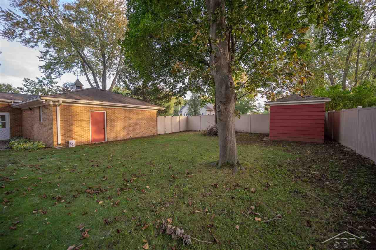 2185 Bock Road Saginaw, MI 48603 - Photo 24 of 26 Your very own private oasis - Privacy Fence 2016. Shed with aluminum siding and backer board