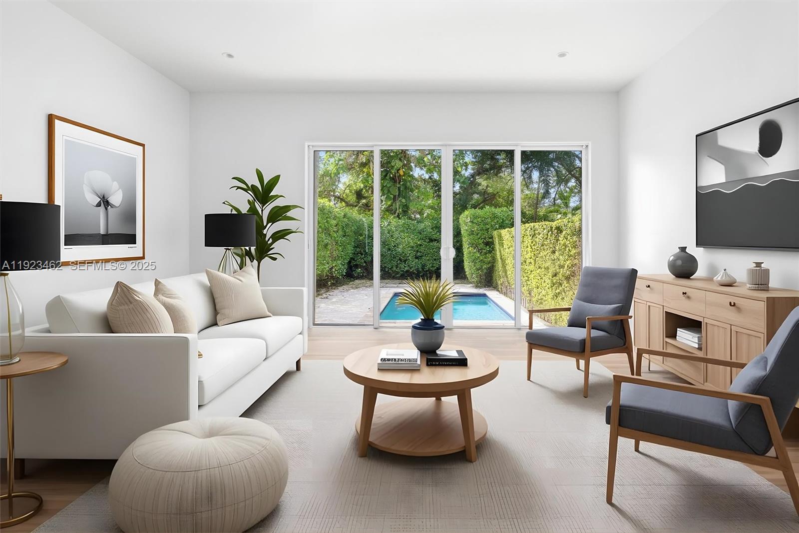 2852 Southwest 32nd Court, Unit 2852 Miami, FL 33133 - Photo 11 of 50 a living room with furniture and a large window