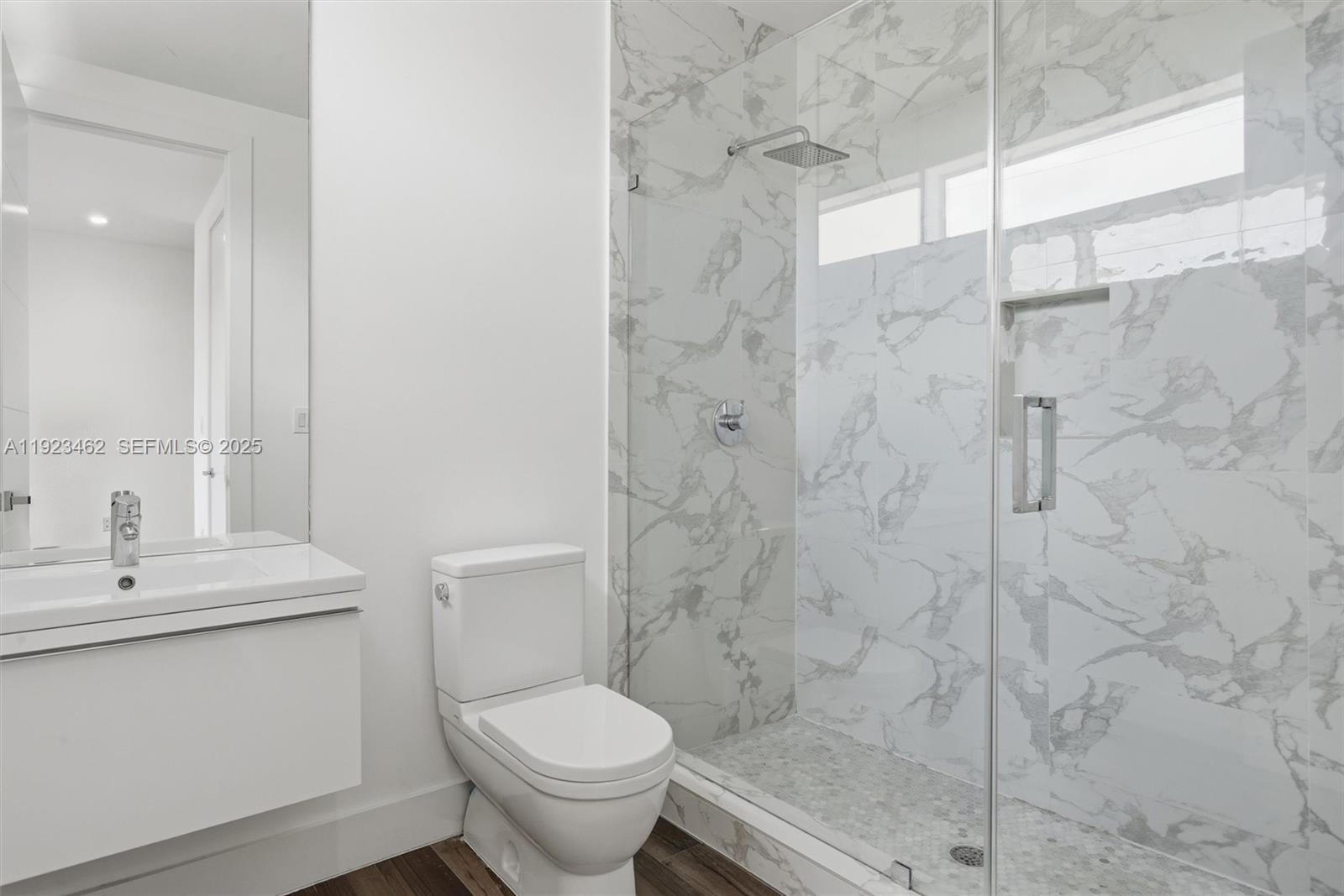 2852 Southwest 32nd Court, Unit 2852 Miami, FL 33133 - Photo 41 of 50 a bathroom with a sink toilet and shower