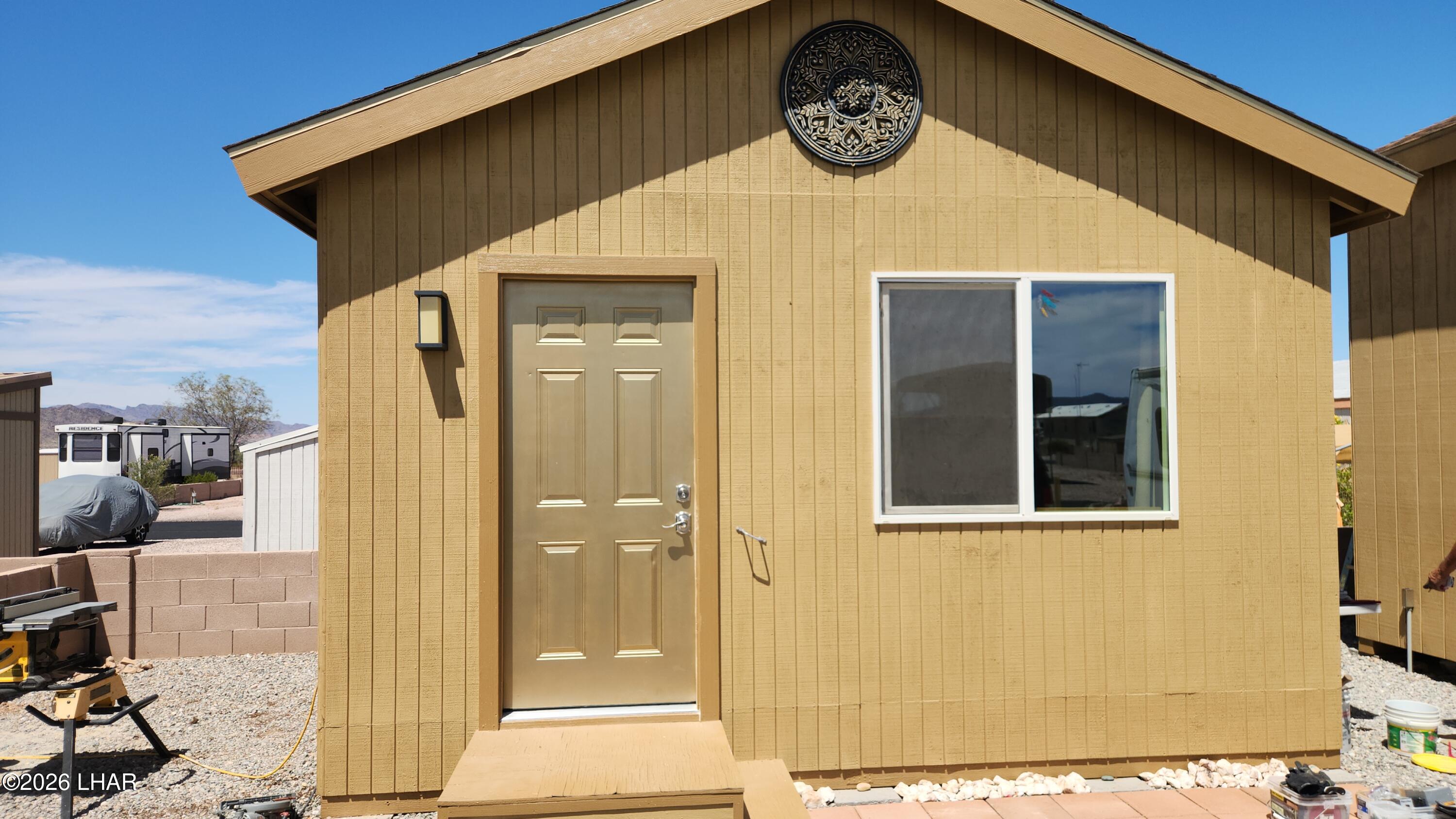 30 North Juniper Road Quartzsite, AZ 85346 - Photo 3 of 26 a view of a door and wooden wall