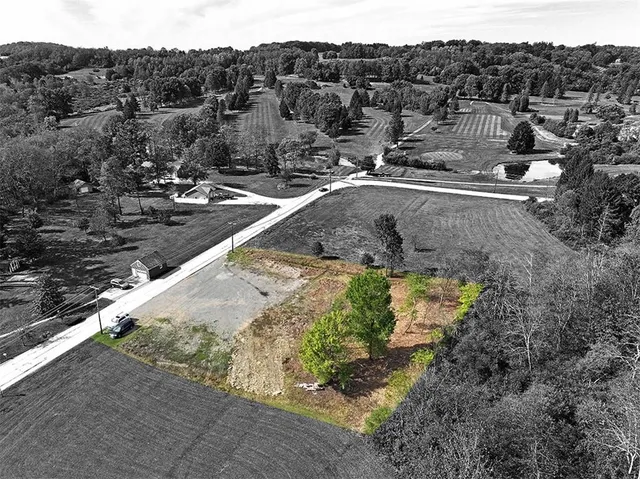 a view of a house with a street