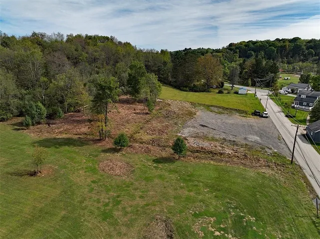 a view of a town with couple of houses